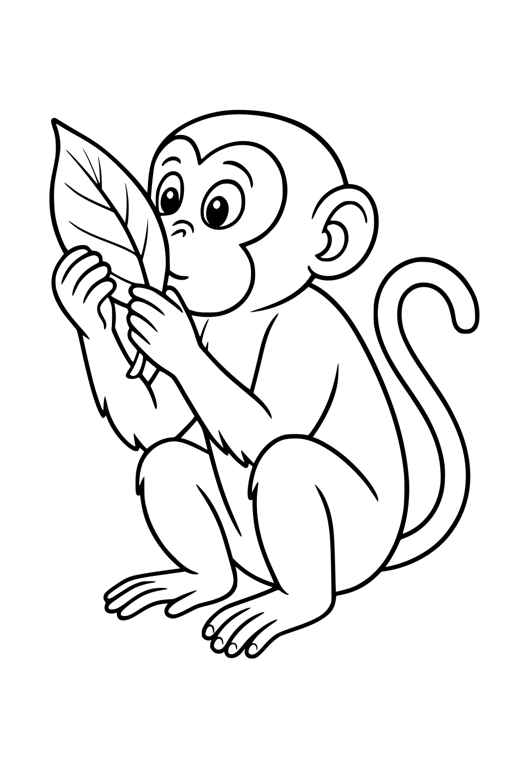 Young monkey crouching, holding a big leaf in front of its face, with a curled tail and wide eyes.