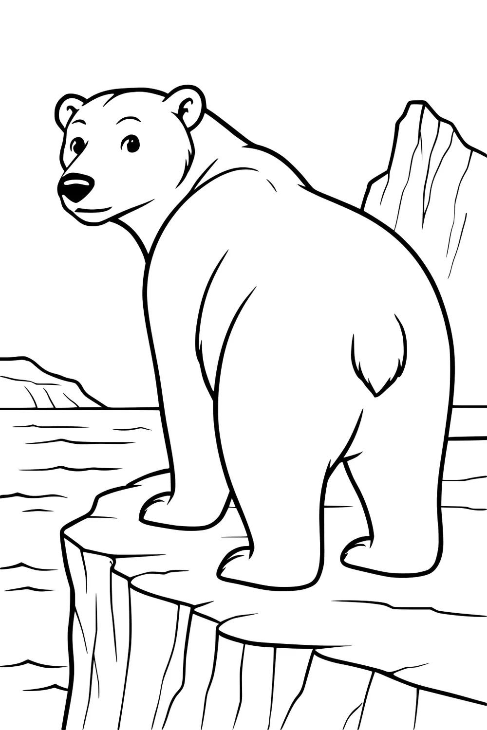 Polar bear stands on icy cliff by the water, mountains rising in the background, looking back over his shoulder.